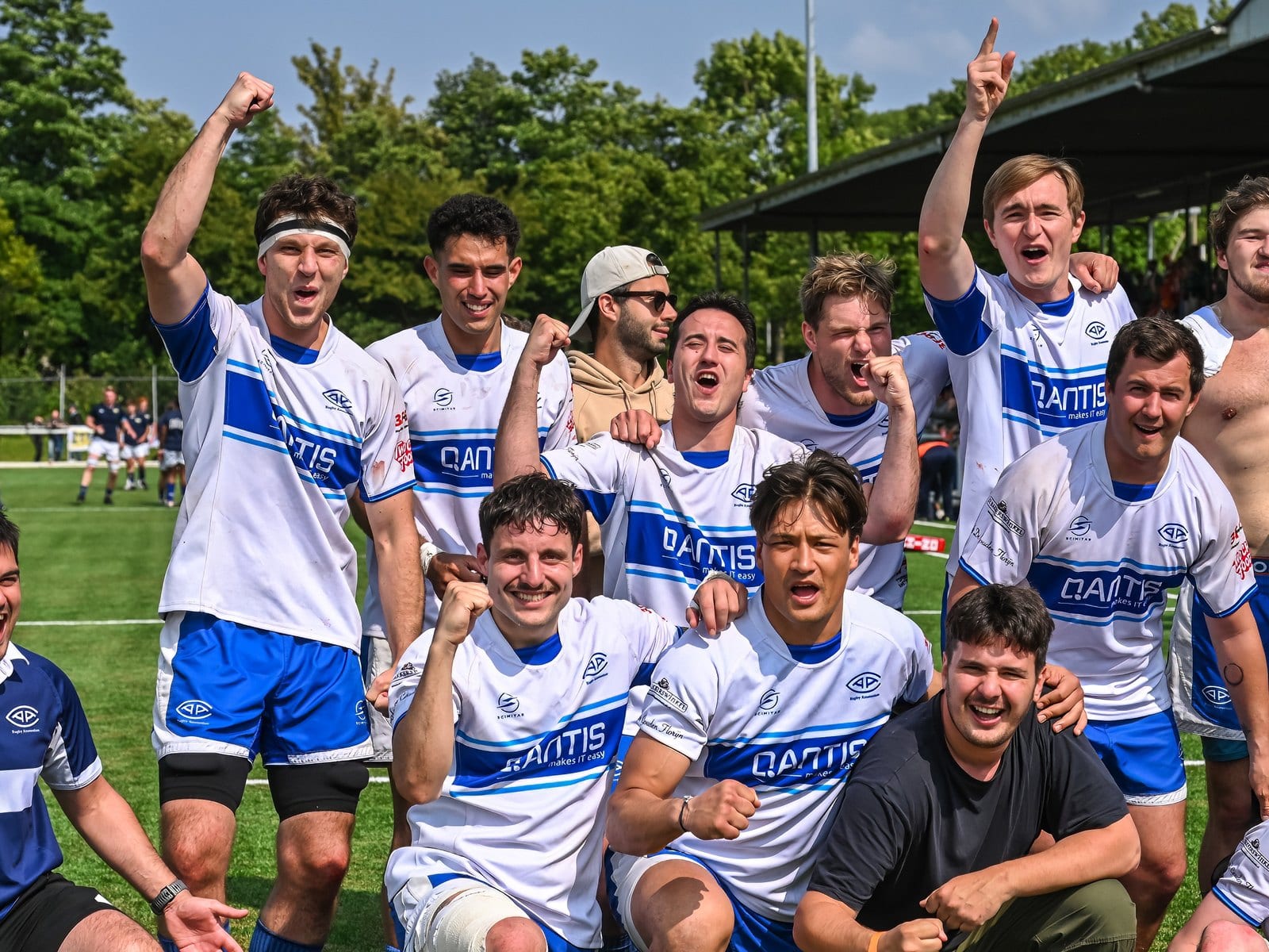 AAC men's side celebrating together after a win