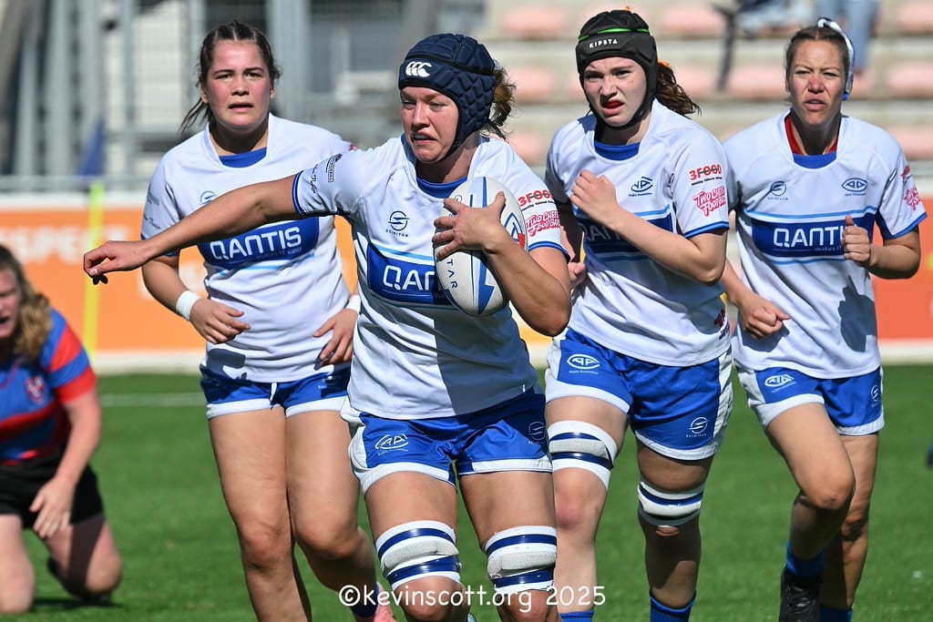 AAC women's ball-carrier breaks clear with teammates in support