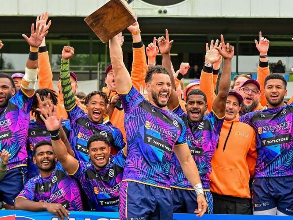 Champions lifting the trophy at the Amsterdam Sevens